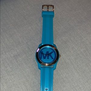 Michael Kors Turquoise and Gold Watch.